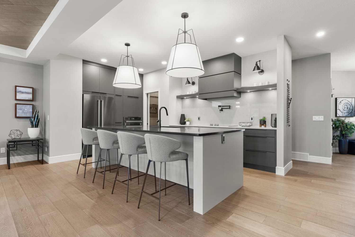 Grey modern kitchen with oversized pendant lights